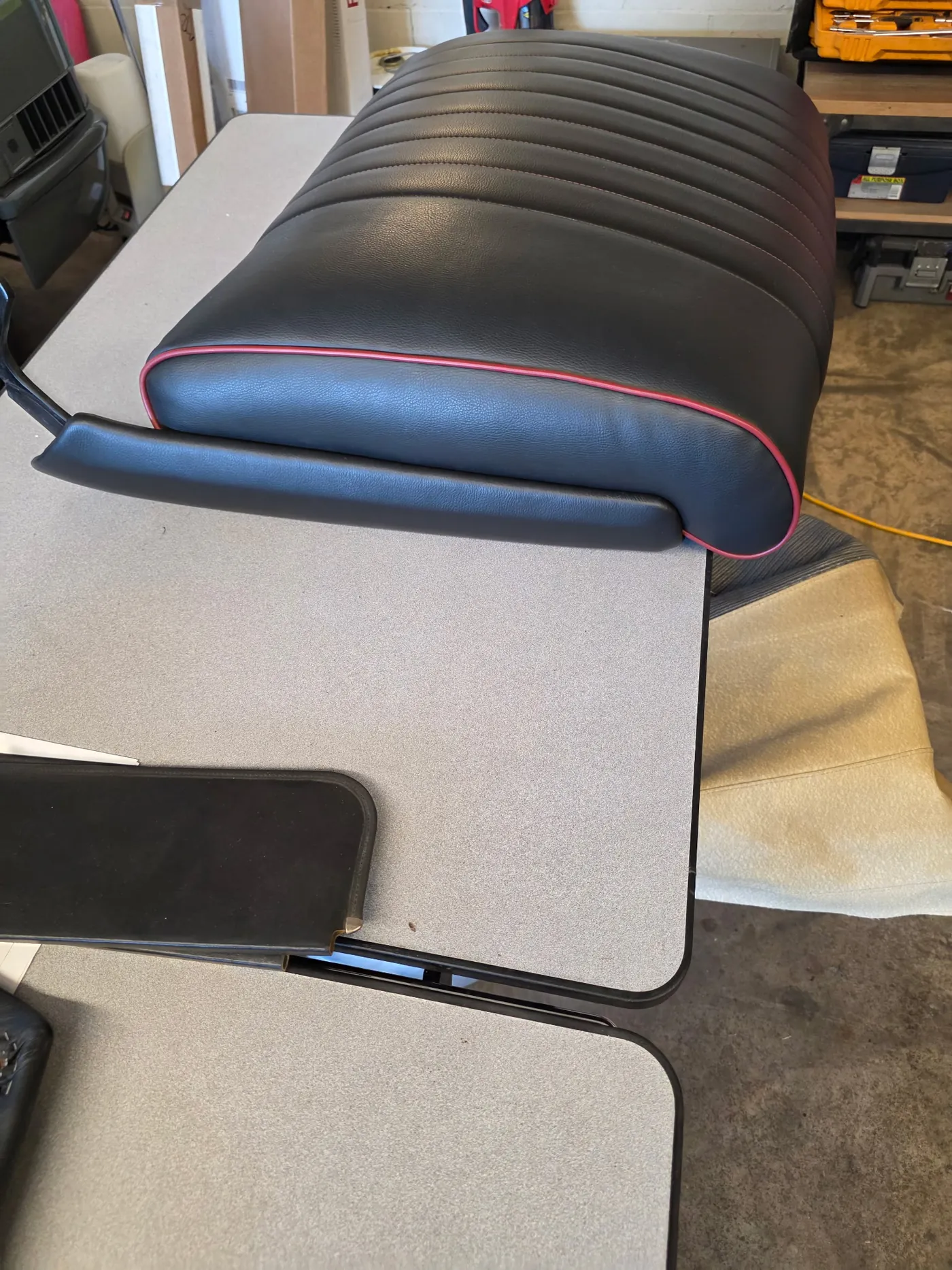 Bench seat with red and blue piping